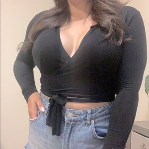 Black long sleeve, low cut, wrap crop top